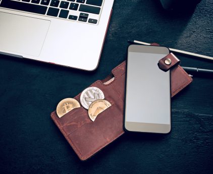 The golden bitcoin, mobile phone, keyboard, credit card. Cryptocurrency bitcoin coins. Litecoin, Bitcoin, Ethereum, e-commerce, busibess, finance concept crypto currency symbol virtual electronic money concepts